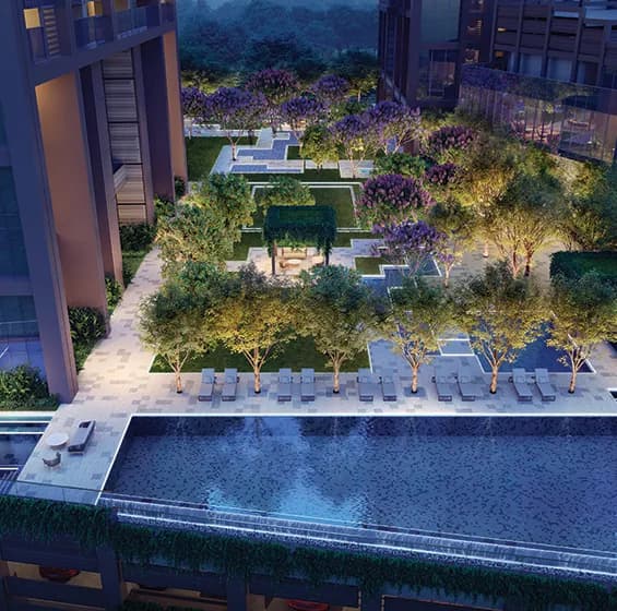 Landscaped gardens and shallow water paths at Runwal Raaya